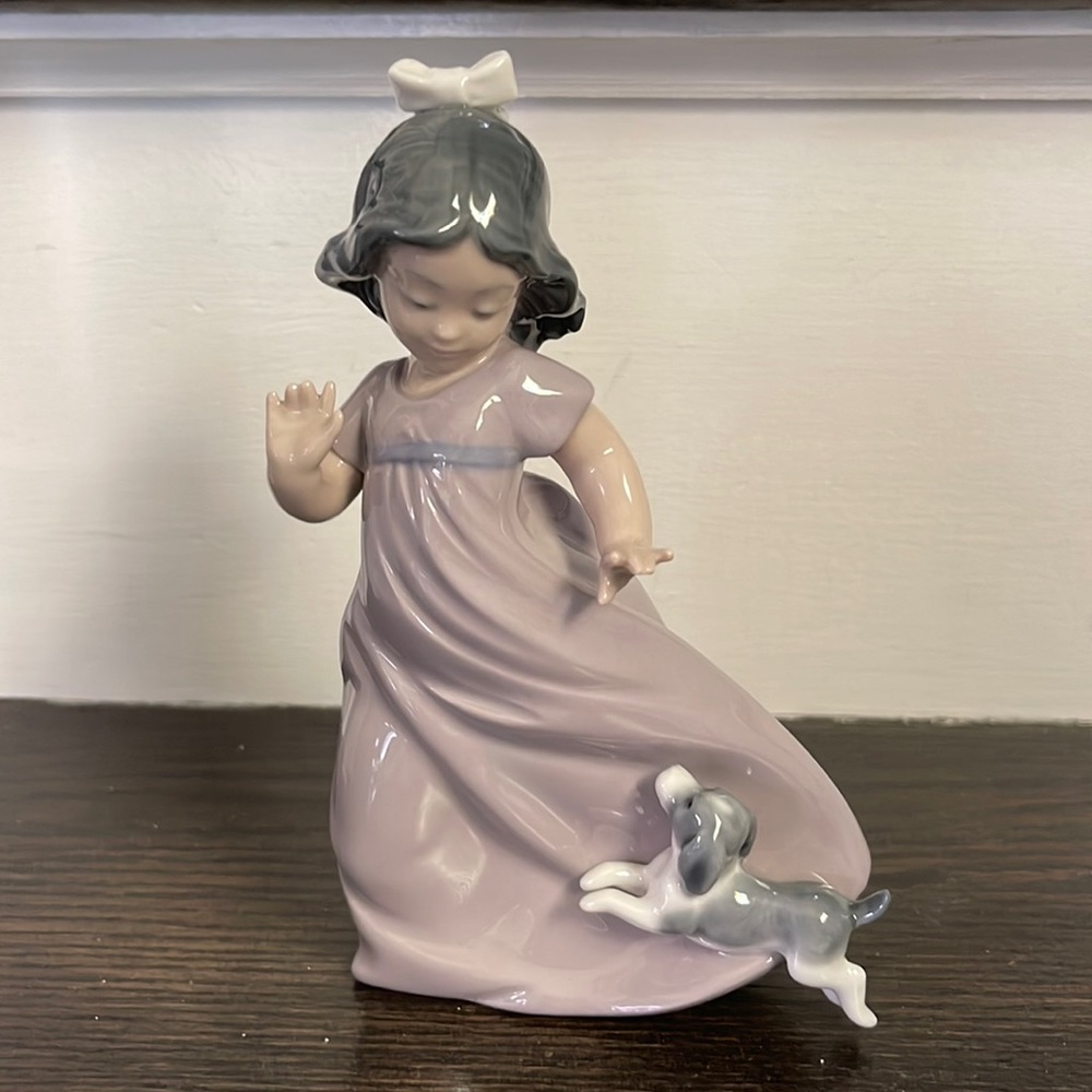 NO LONGER AVAILABLE. Nao. Dark haired girl playing with puppy. Perfect